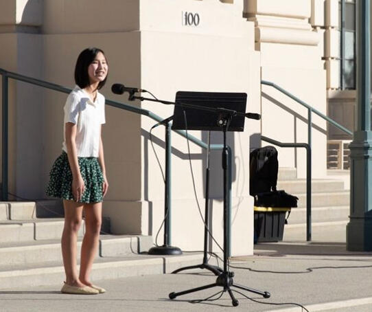 Speaker at Rally for a Clean Green Pasadena (2022) on the steps of Pasadena City Hall, featured on Polytechnic School's website with video of speech